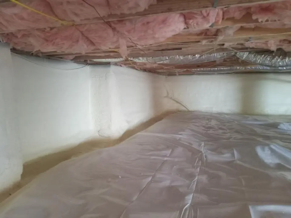 Crawl space encapsulation with closed-cell spray foam for Commercial Roof Restoration in Fairhaven
